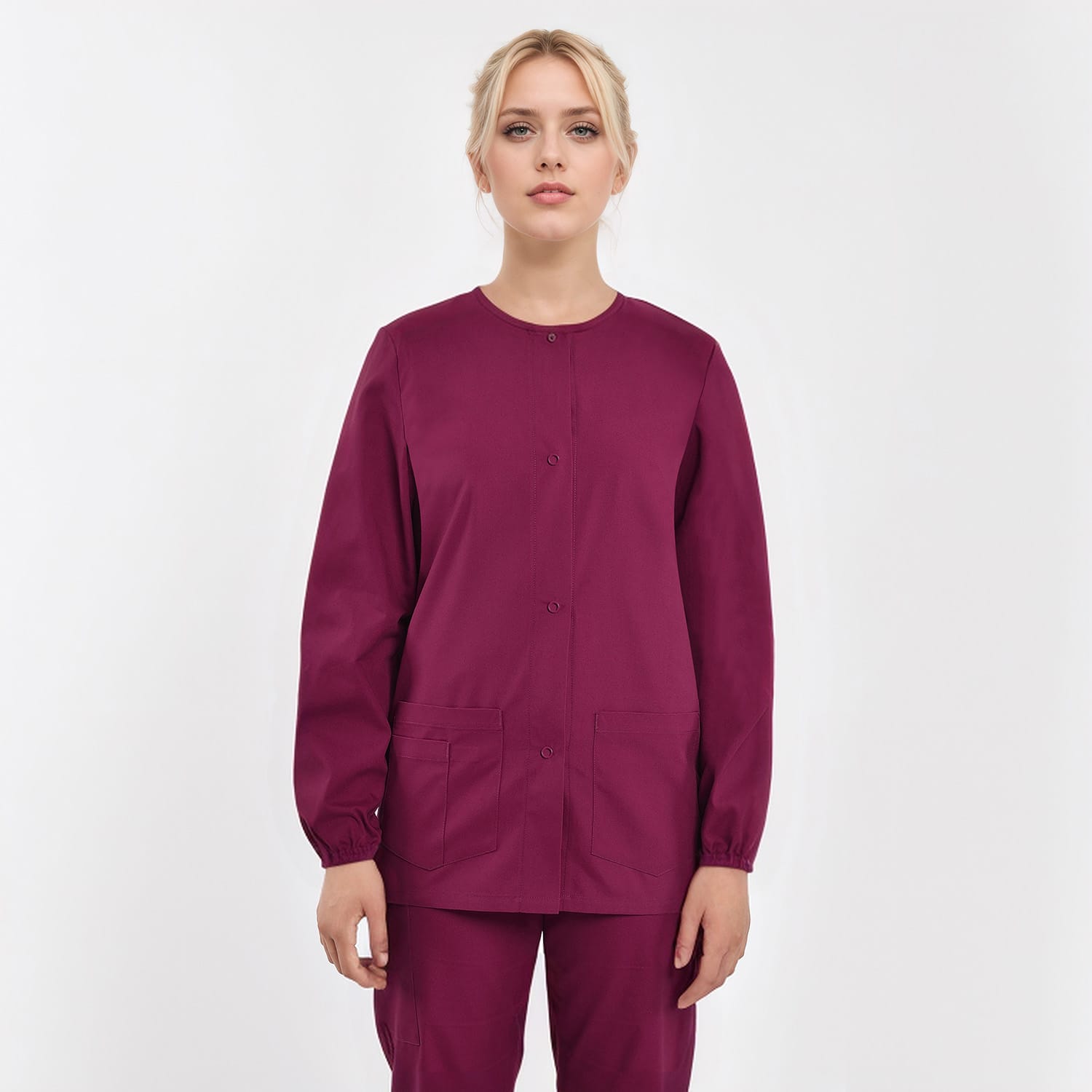 Unisex burgundy medical scrub jacket with button closure and two front pockets for healthcare professionals.