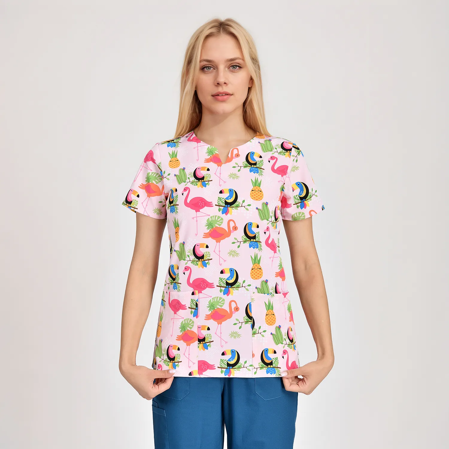 Fashionable women’s medical scrub print top with animal prints, breathable fabric, short sleeves, and two pockets, offering comfort and style for healthcare professionals.