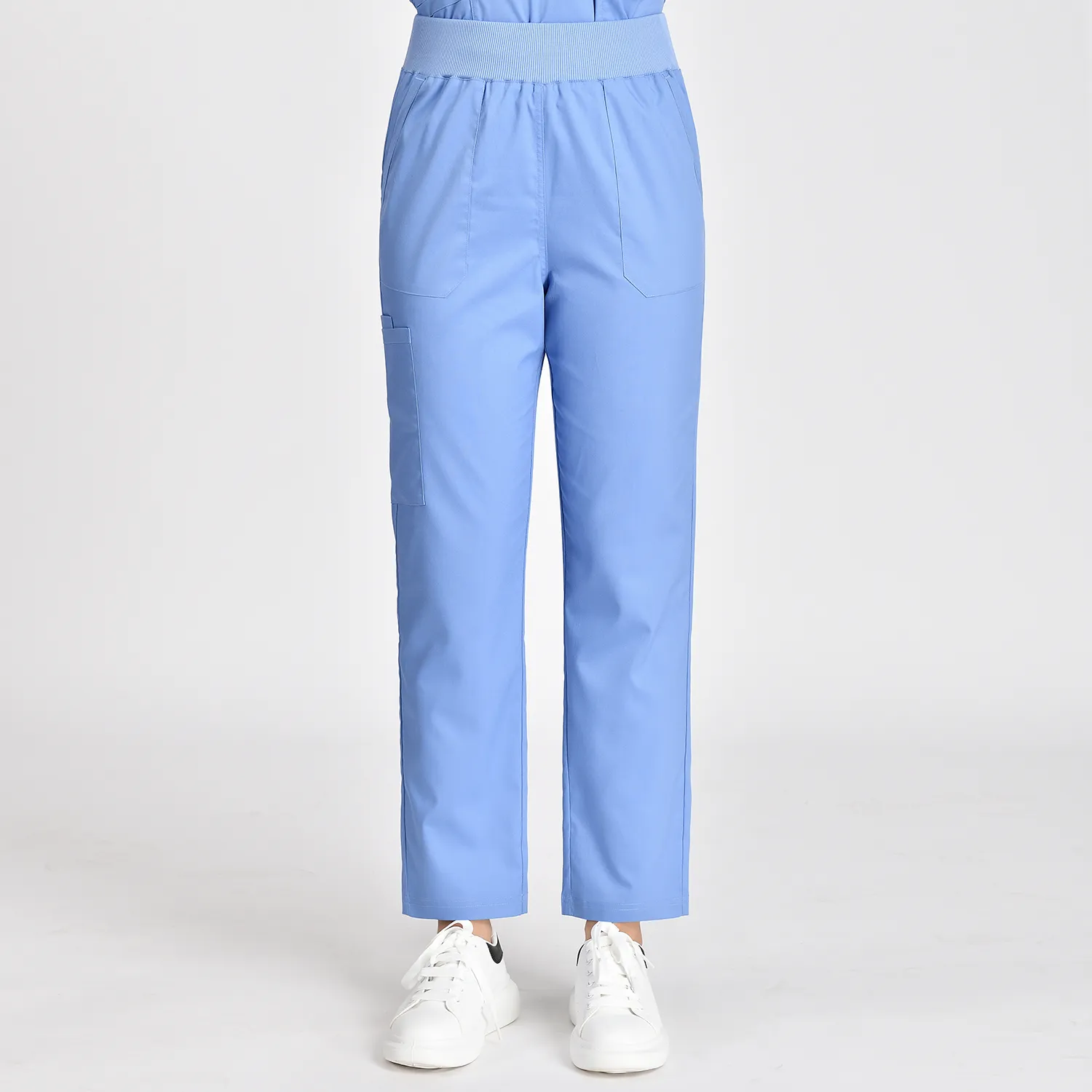 Close-up of women's blue medical scrub pants with drawstring waist, cuffed legs, and multiple pockets, ideal for healthcare professionals.