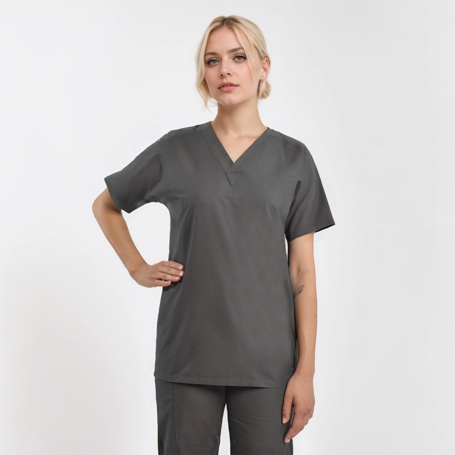 Unisex V-neck scrub top in gray, designed for comfort and durability, ideal for healthcare professionals.